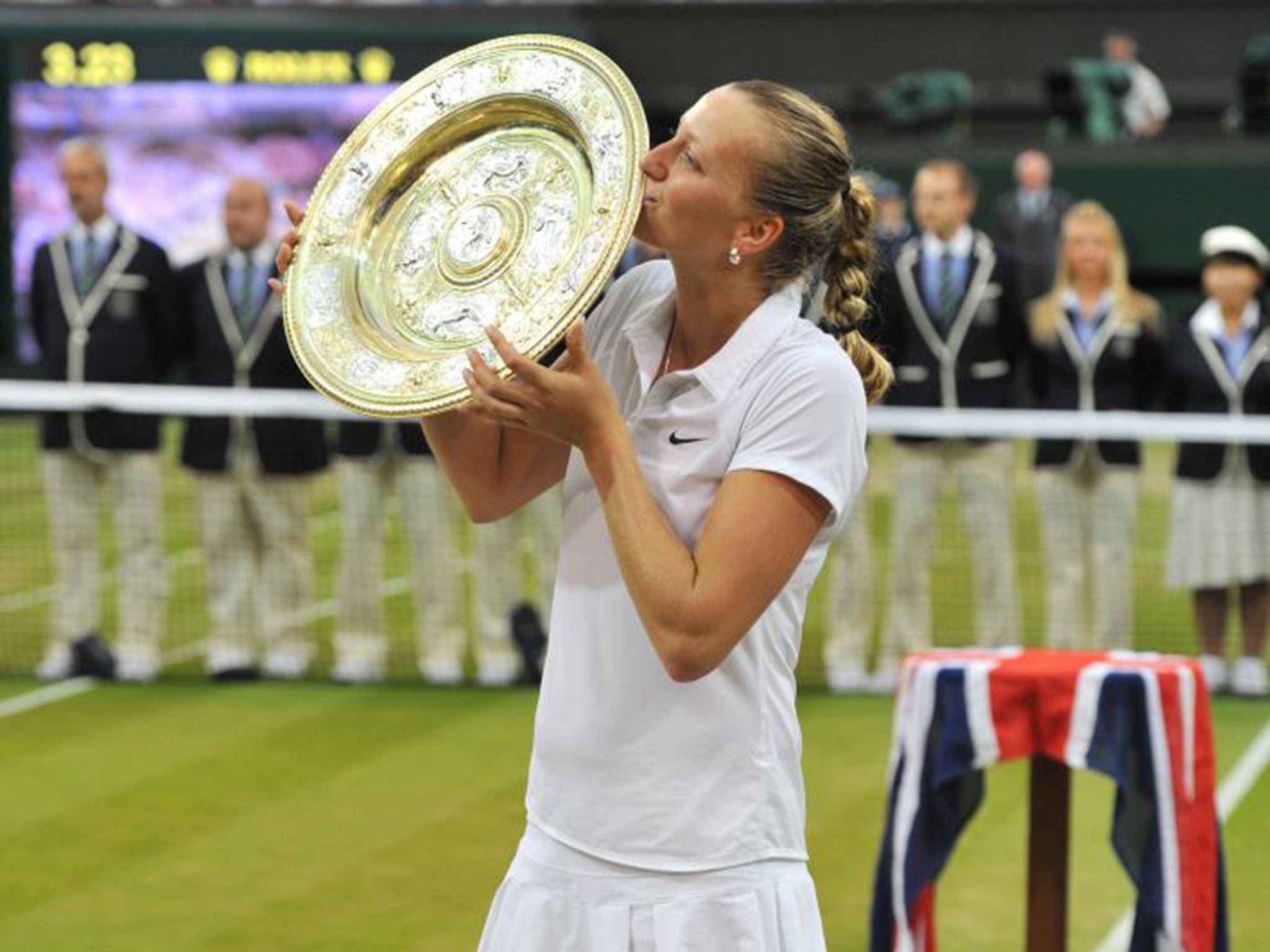 Petra Kvitova shows off the Venus Rosewater Dish after beating Eugenie Bouchard in just 55 minutes in last year’s Wimbledon final