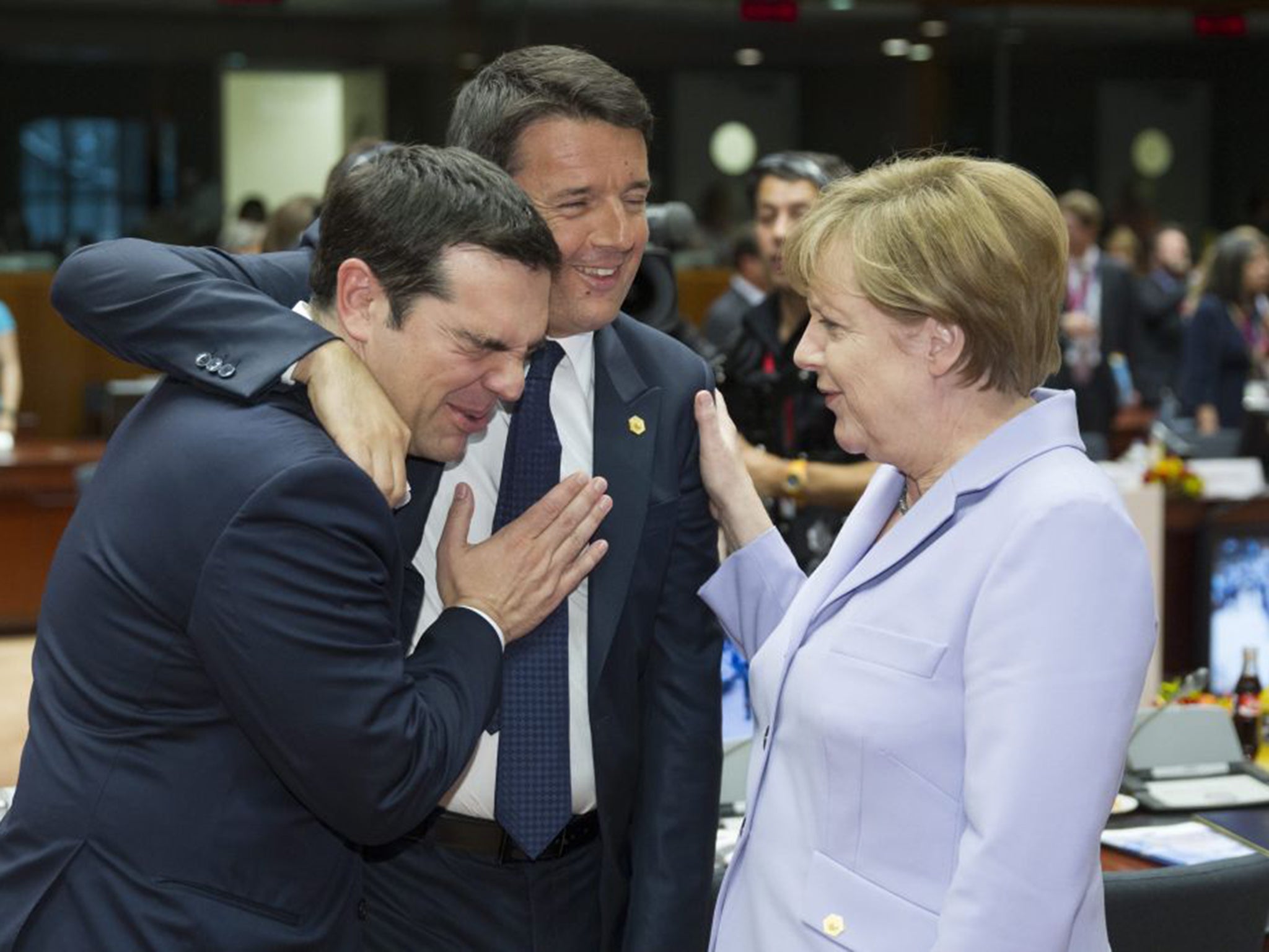 Greek Prime Minister Alexis Tsipras, Italian Prime Minister Matteo Renzi and German Chancellor Angela Merkel during one of the summit meetings in Brussels on Thursday (EPA)