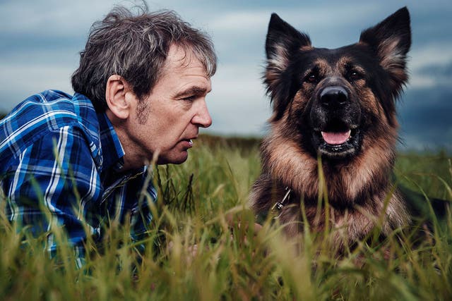 Presenter Mark Evans with a canine companion