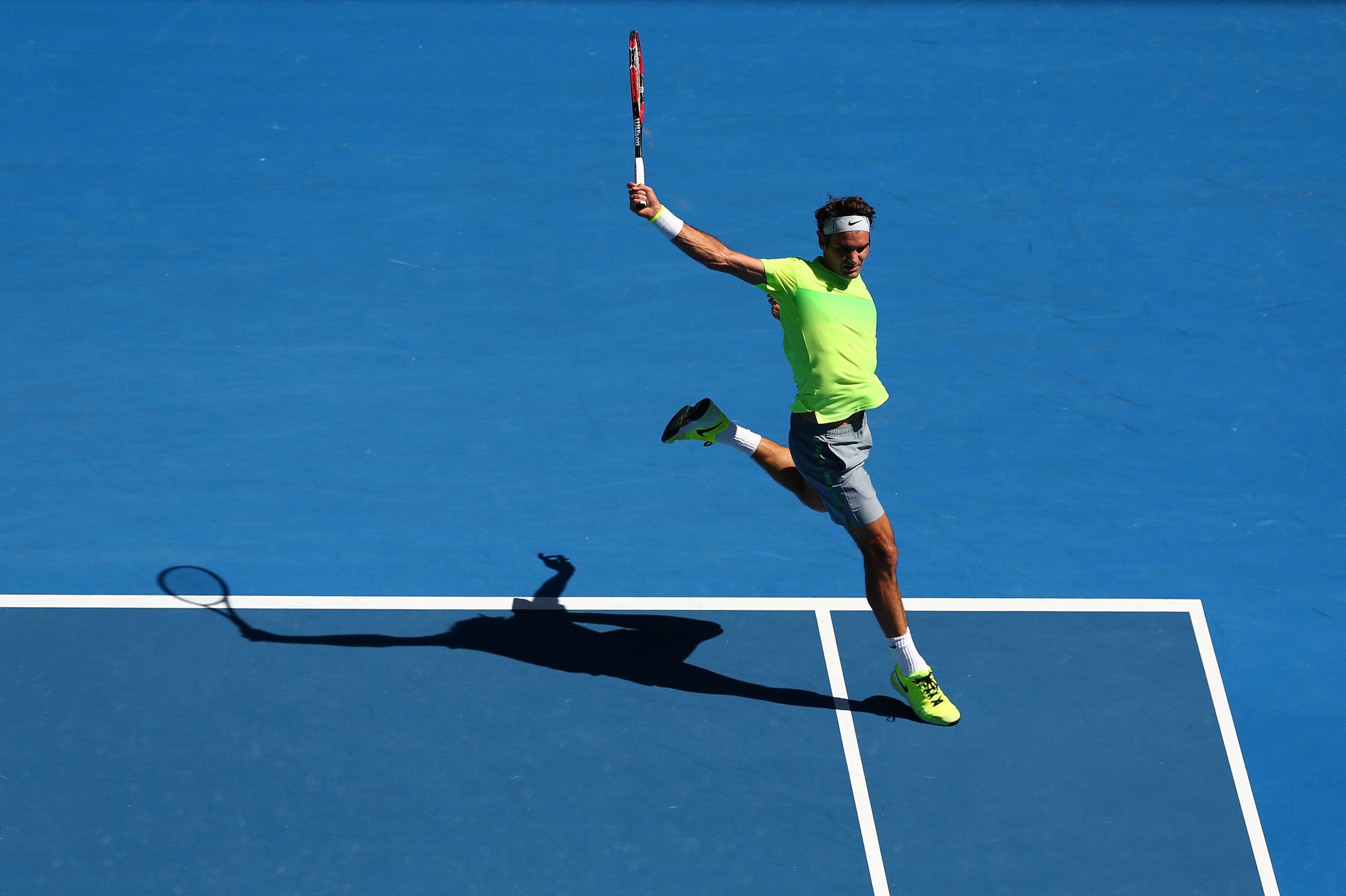 Roger Federer plays a backhand at the 2015 Australian Open in January
