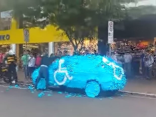 Brazilian vigilantes deliver justice to a driver illegally parked in a disabled bay