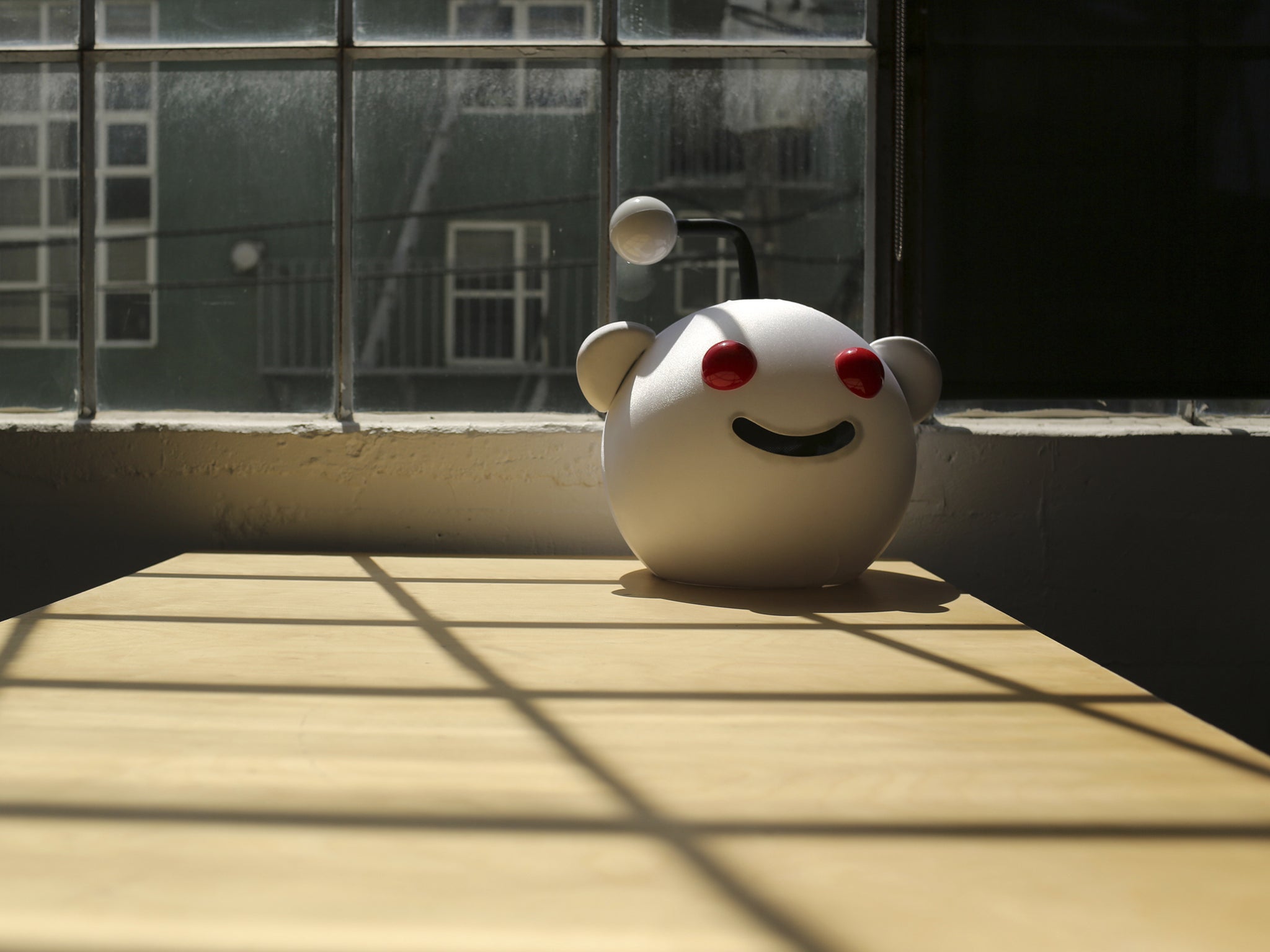 A Reddit mascot is shown at the company's headquarters in San Francisco, California April 15, 2014