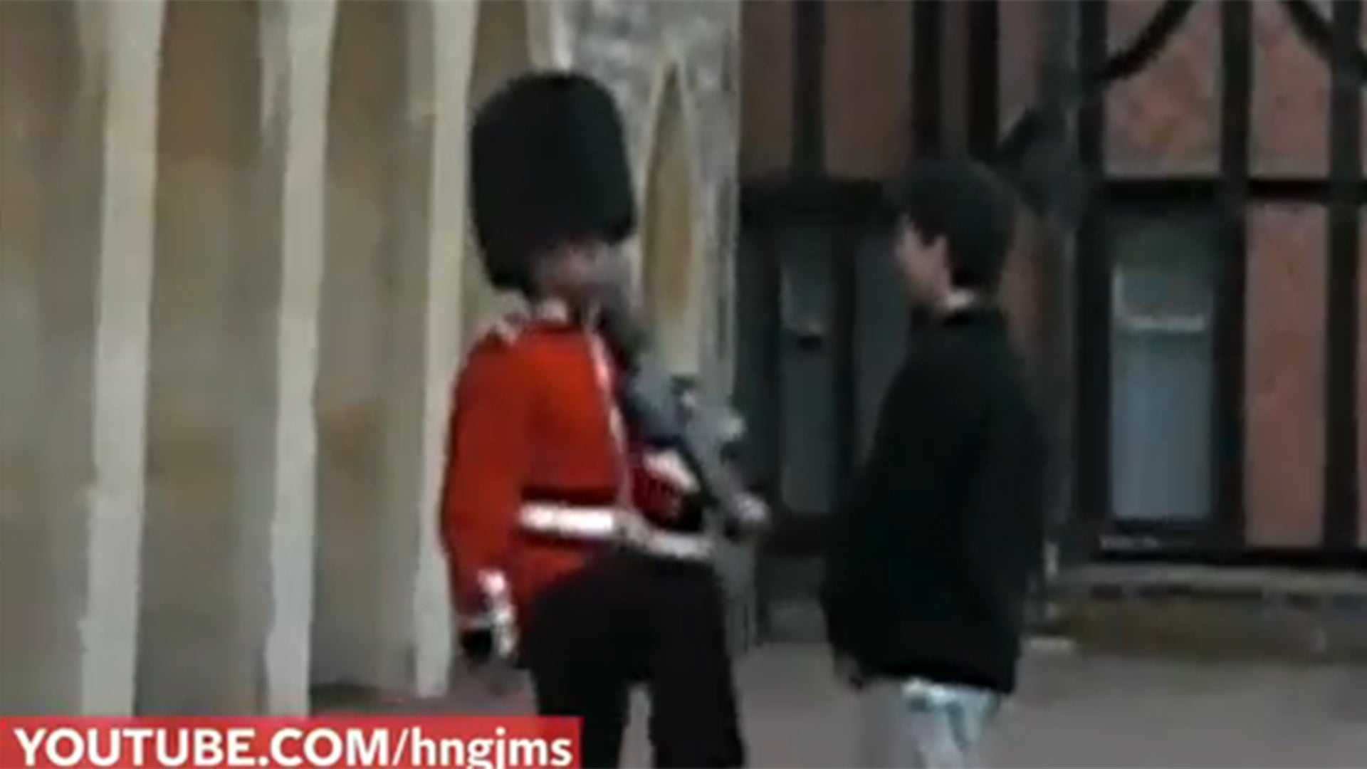 He even stares the Queen's Guard straight in the face.