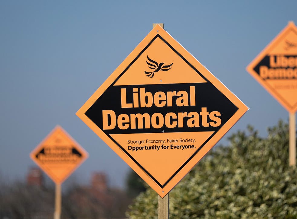 Campaign signs showing support for the Liberal Democrat candidate Josh Mason are seen outside homes on April 24, 2015 in Redcar, England.