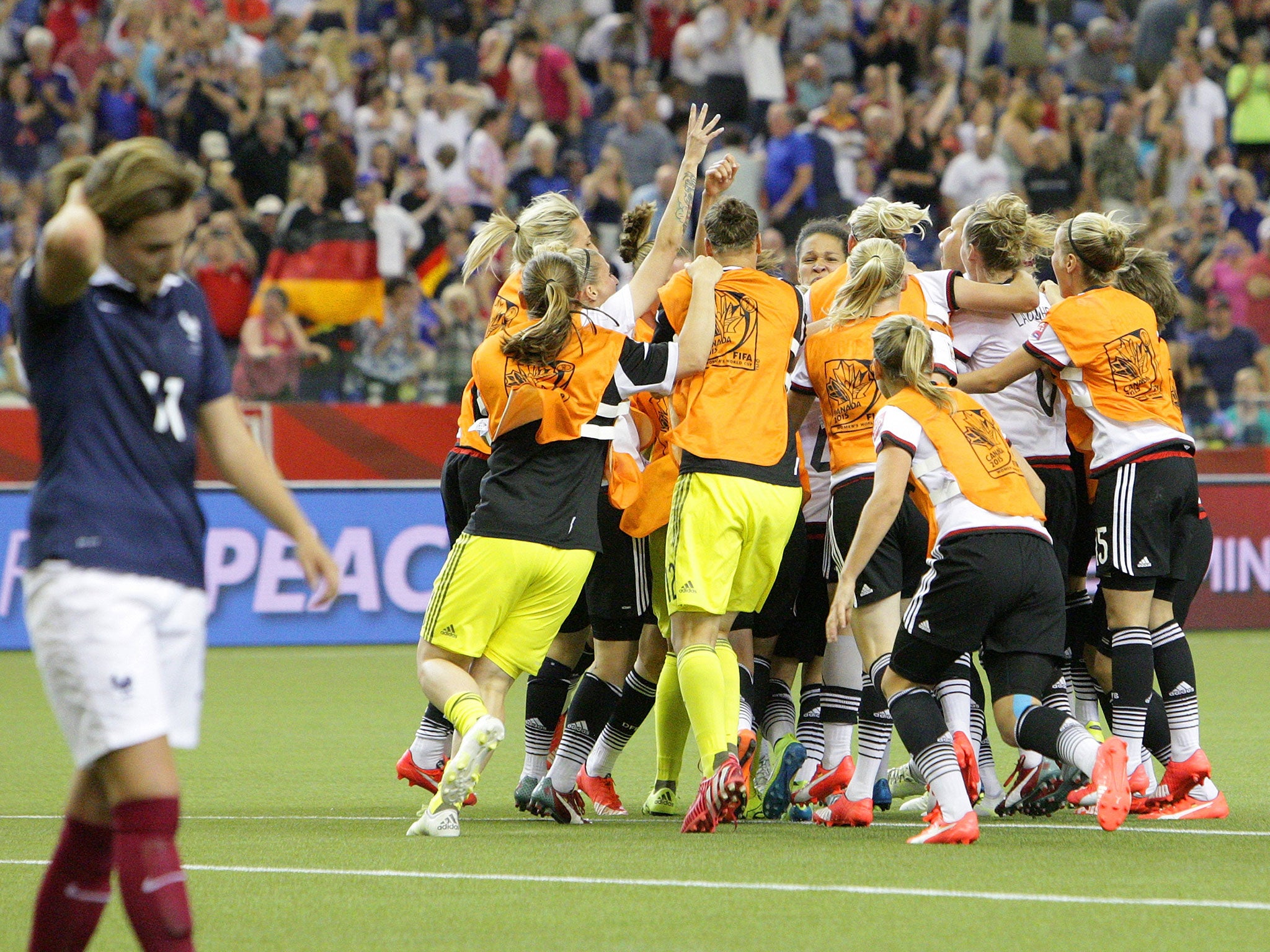 Germany celebrate beating France in the quarter-finals after Claire Lavogez's decisive spot-kick