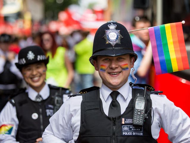 Police officers take part in the annual Pride in London Parade