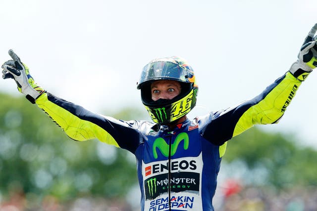 Valentino Rossi celebrates his victory during the Dutch MotoGP race in Assen