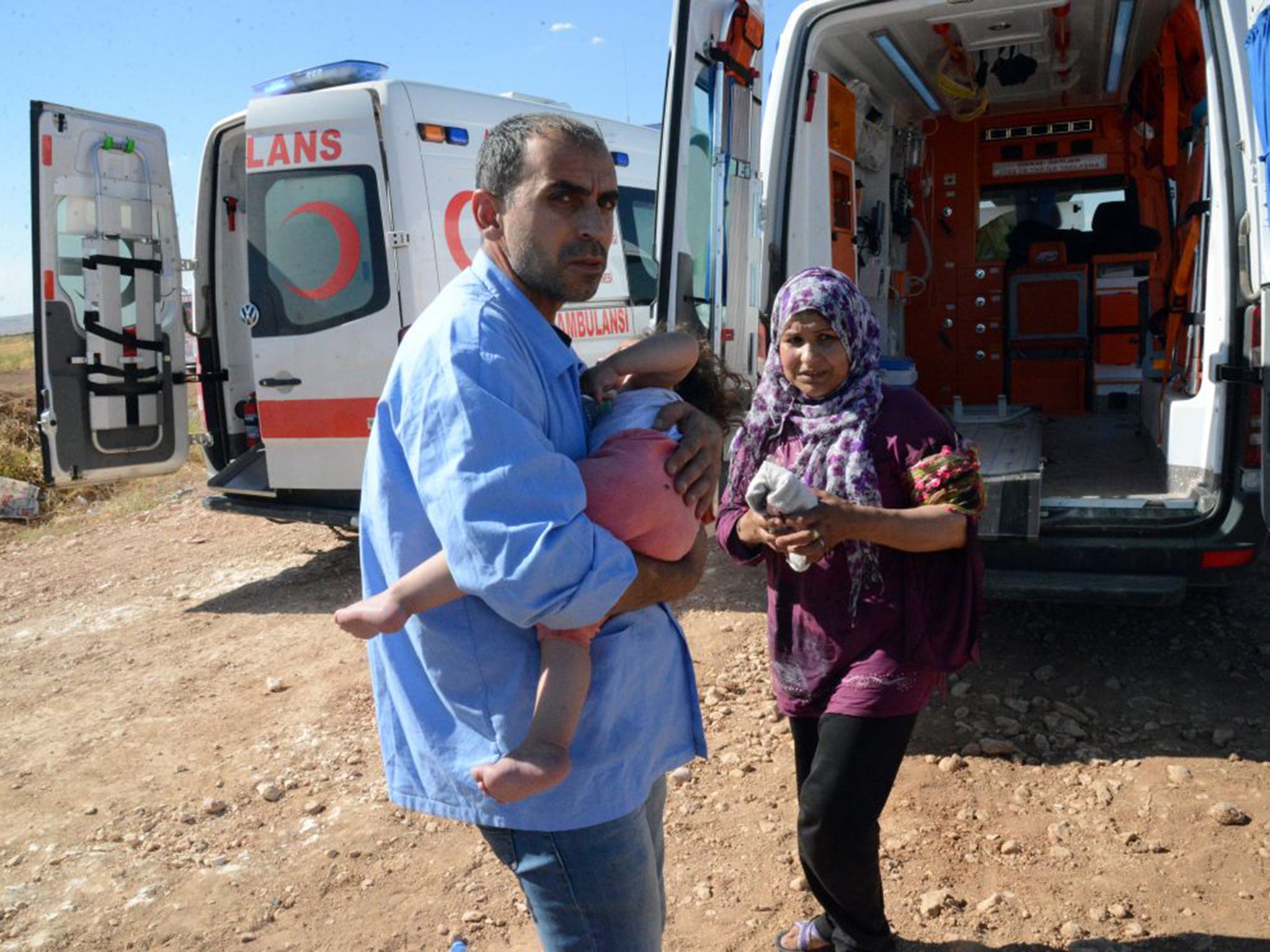 A Syrian family in Turkey after escaping over the border from Kobani