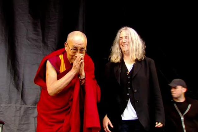 Dalai Lama thanks Glastonbury for birthday messages with Patti Smith on Pyramid Stage