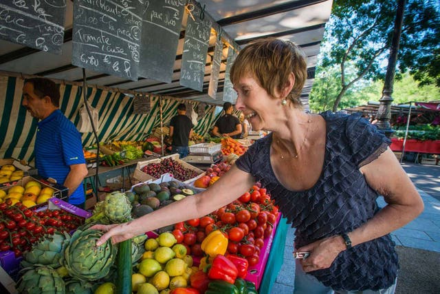 Anne Penketh shops for fruit near her home in Paris