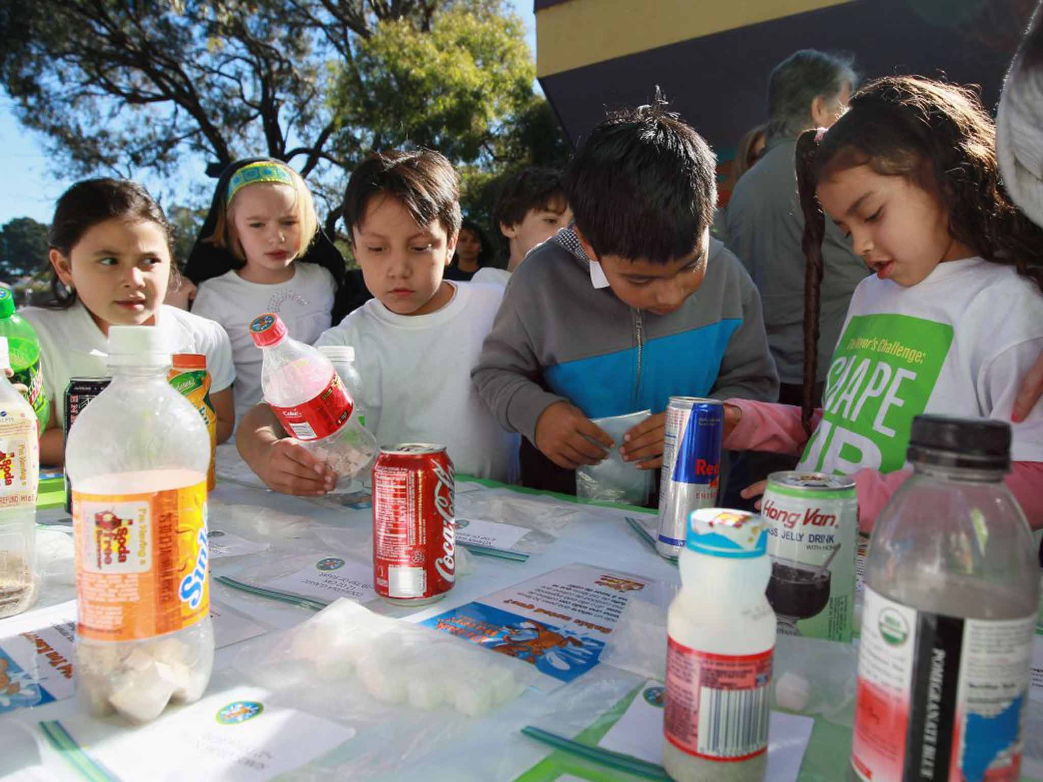 Children at a primary school in San Francisco learn about the sugar content in soft drinks and juices