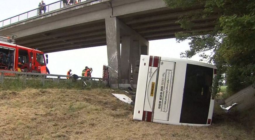 The bus veered off the motorway, killing one of the drivers and hospitalising three children and two teachers