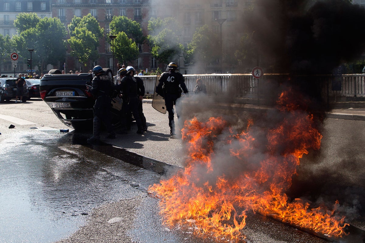French police arrest two top Uber executives after Paris cab riots ...
