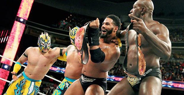 The Lucha Dragons and Prime Time Players celebrate