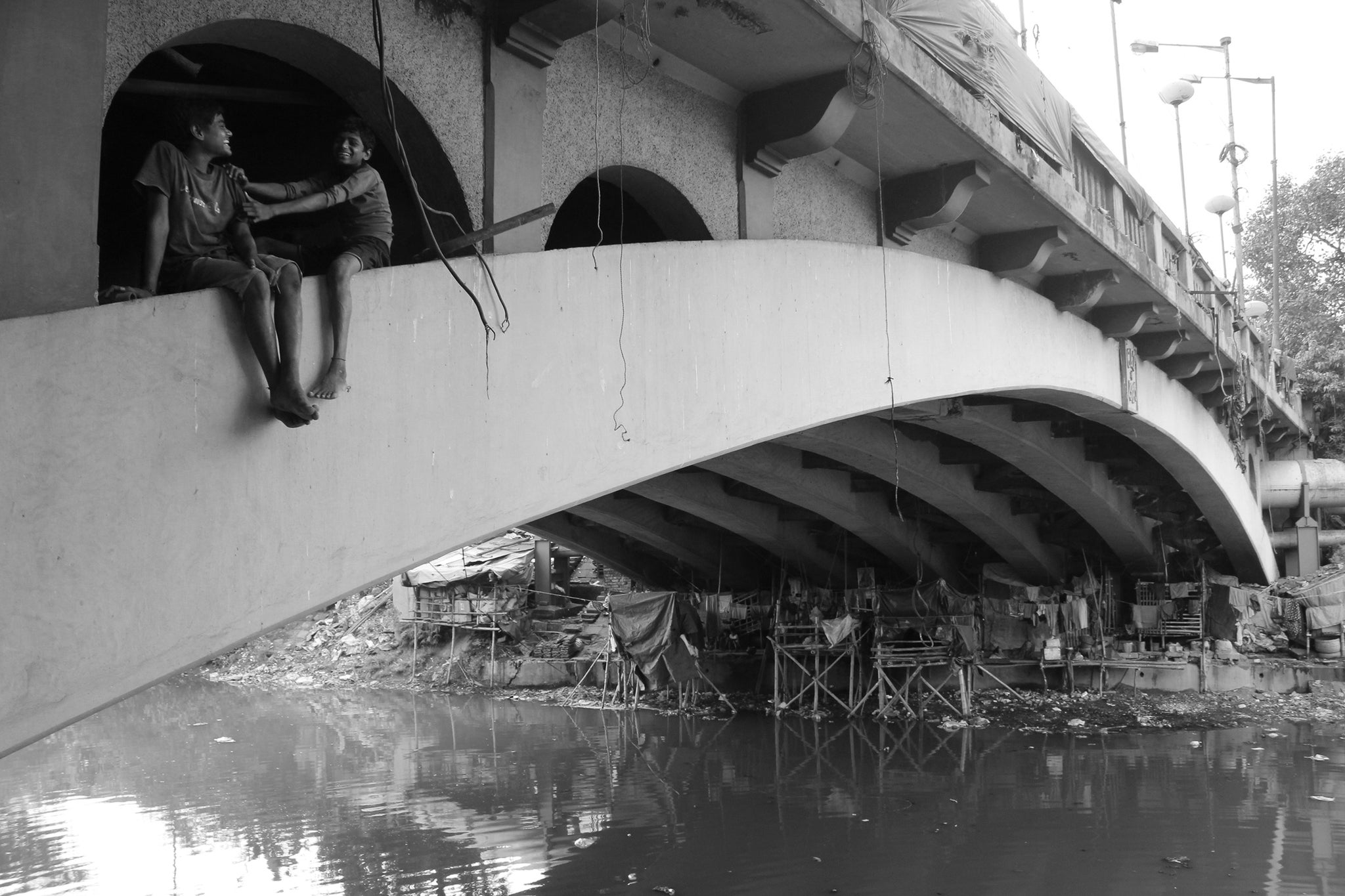 "Families Are Living Under The Bridge" by Bhar Dipayan