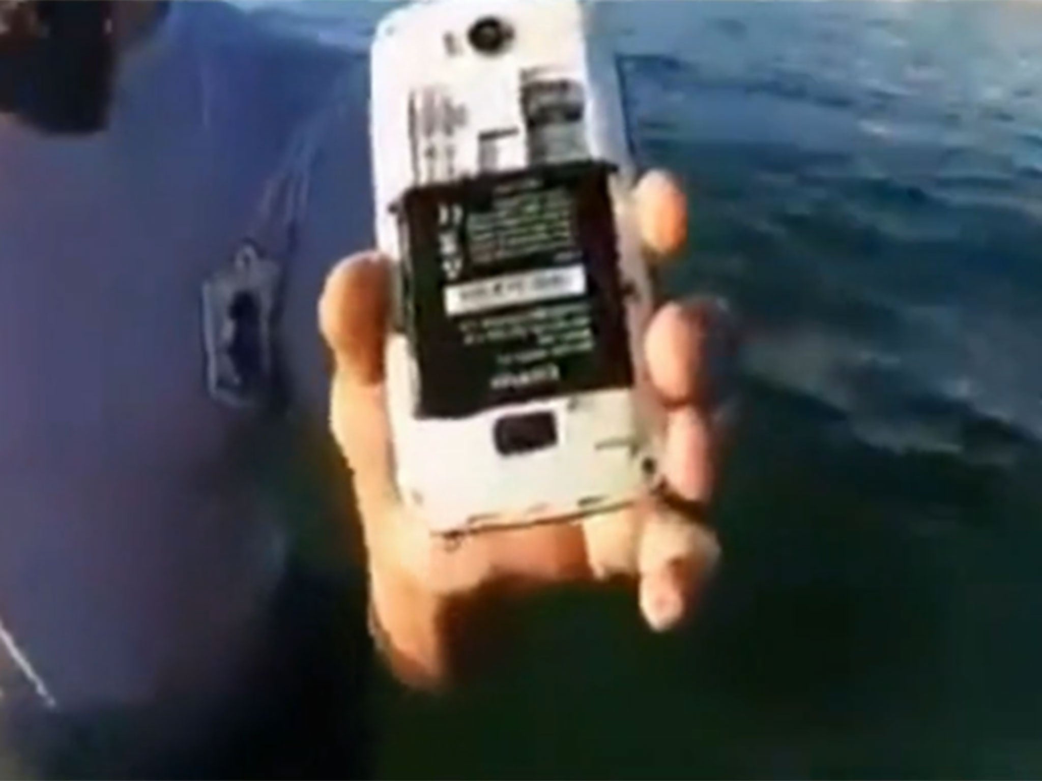 A video posted online appeared to show police retrieving Seifeddine Rezgui's phone from the sea
