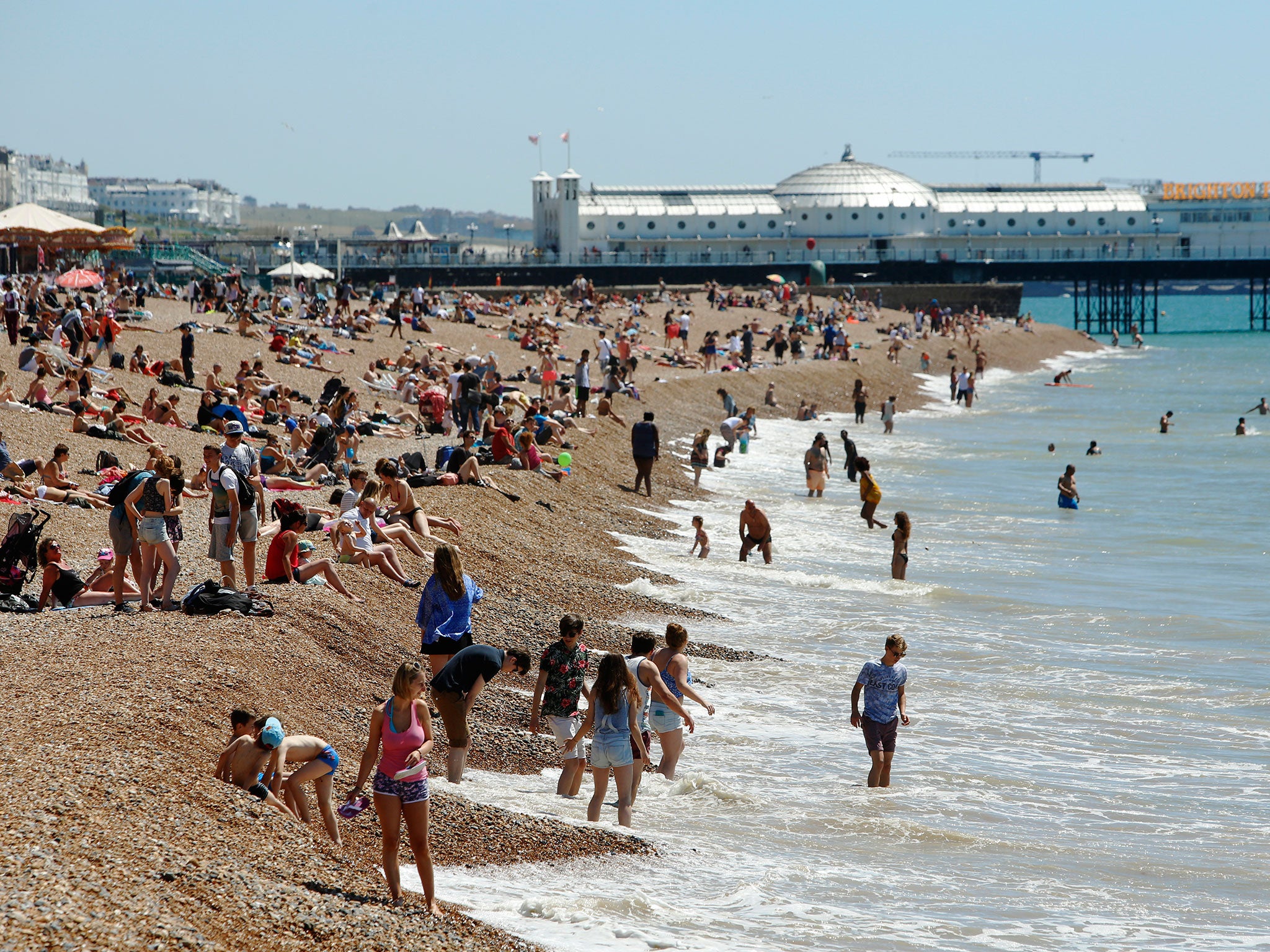 More revellers taking in the sun on Brighton beach