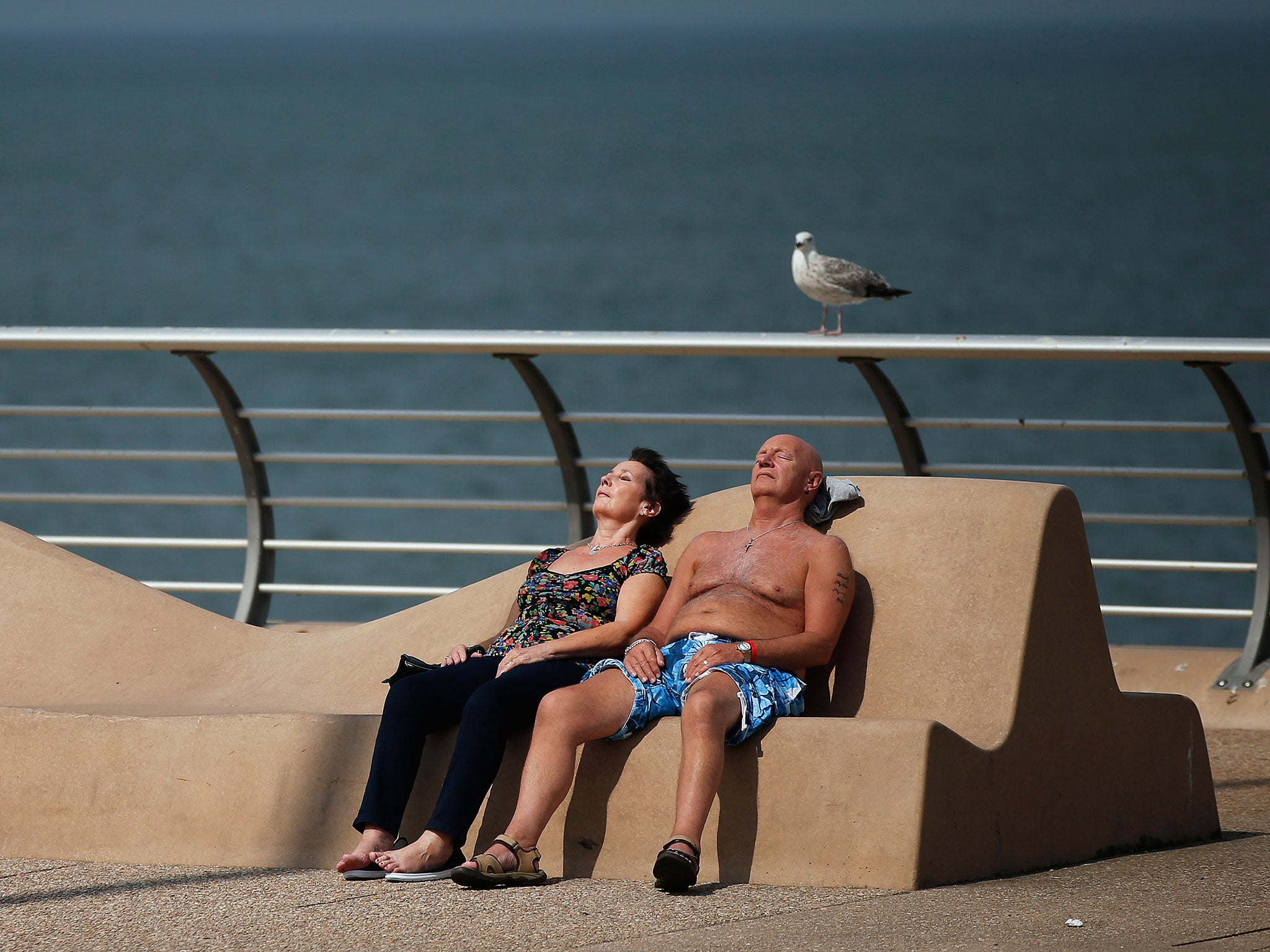 A couple sunbathing in Blackpool