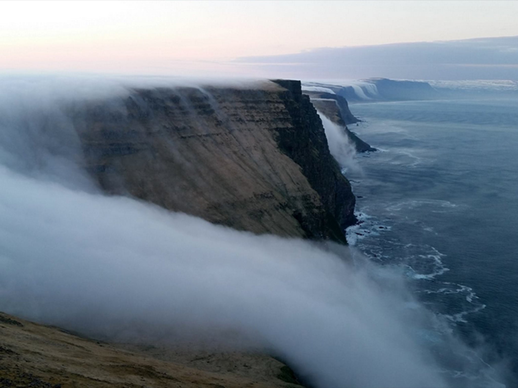 Video shows a river of fog rolling off the coast of Iceland The Independent The Independent photo