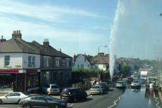UK heatwave: Burst water pipe in Tooting in south London sends stream
