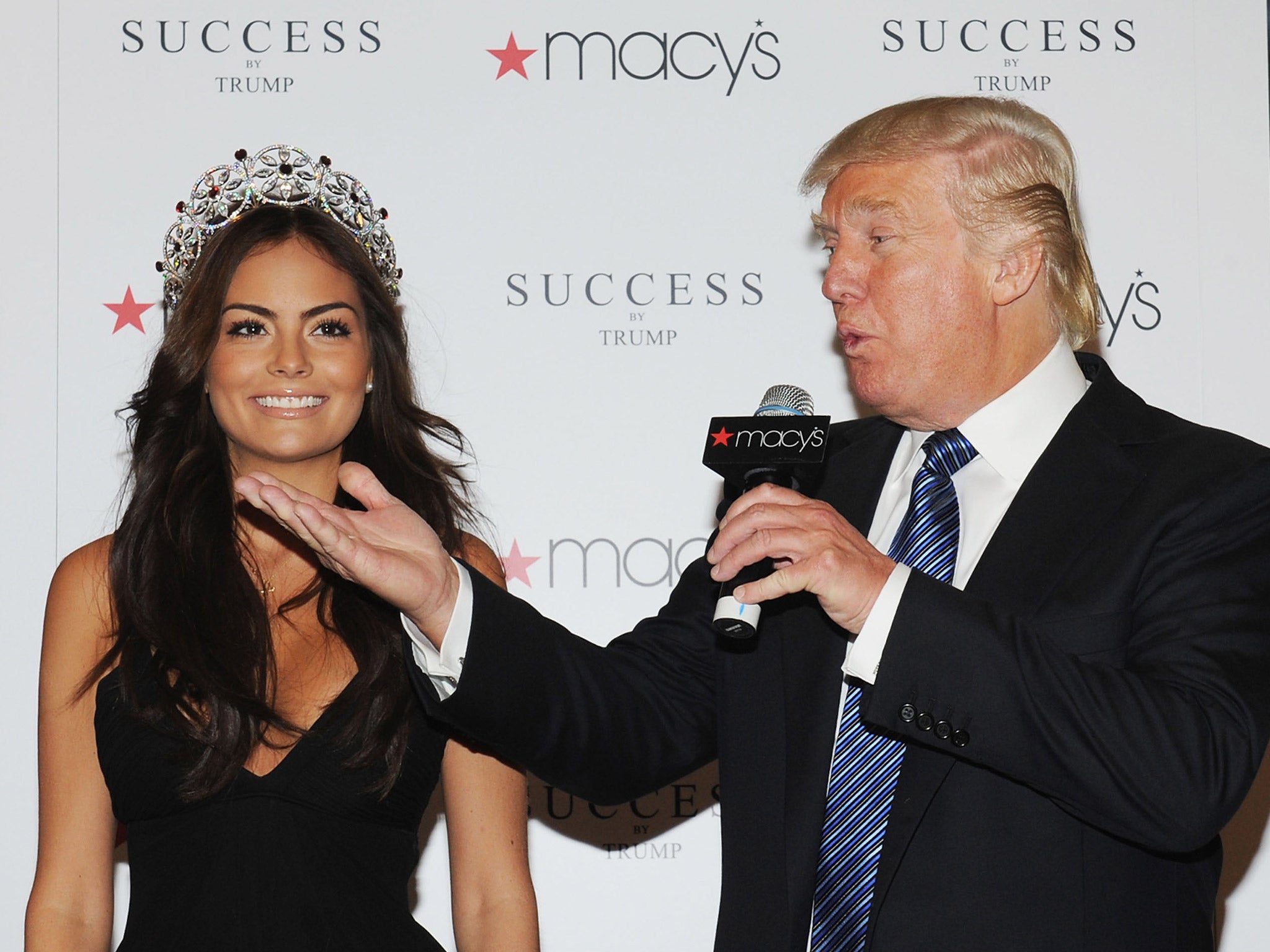 Donald Trump, pictured with Miss Universe 2010 Ximena Navarrete, at the launch of the Billionaire's fragrance, Success, at Macy's in New York City, in 2012