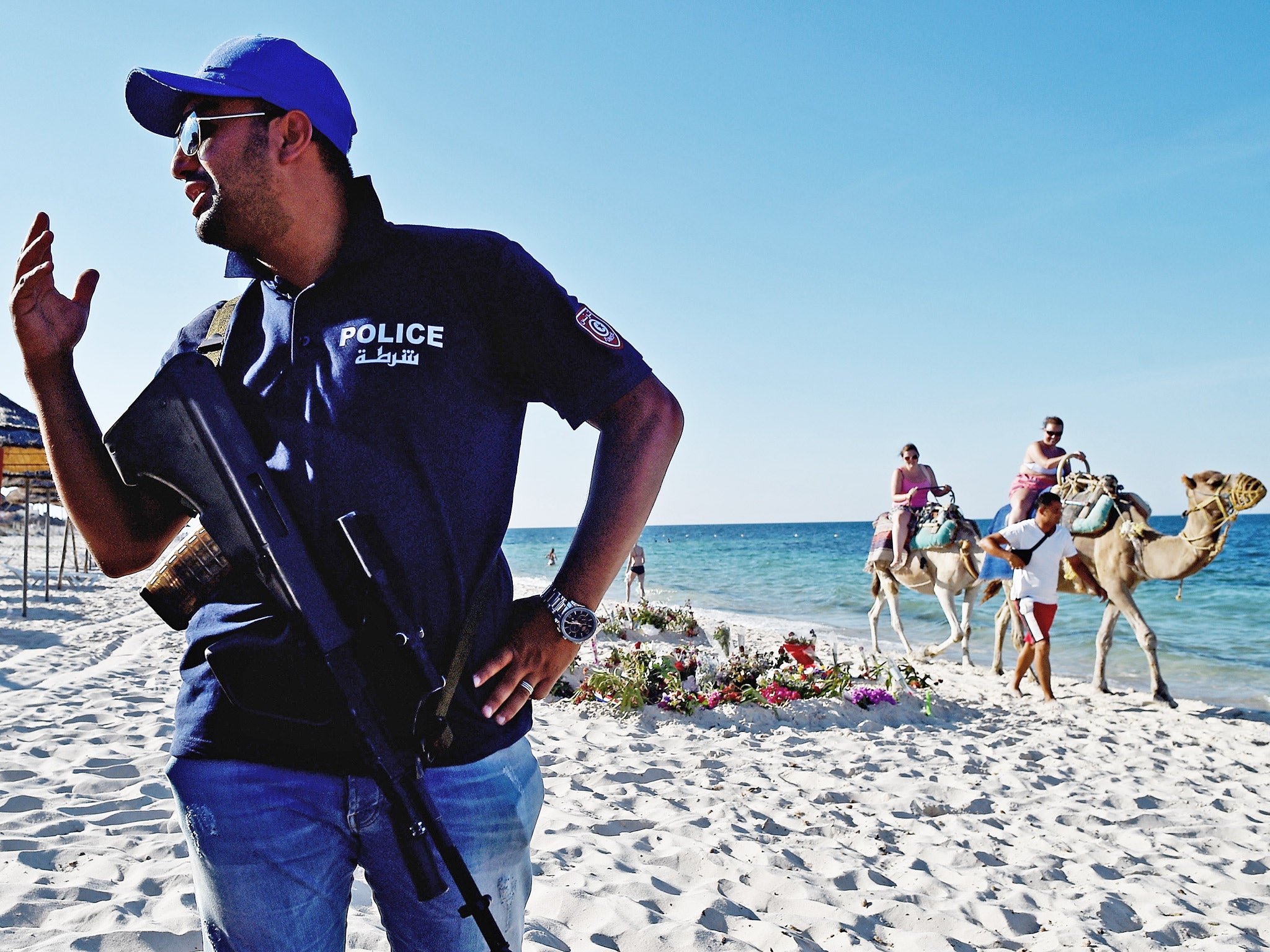 Armed police continue to patrol Marhaba beach in Sousse