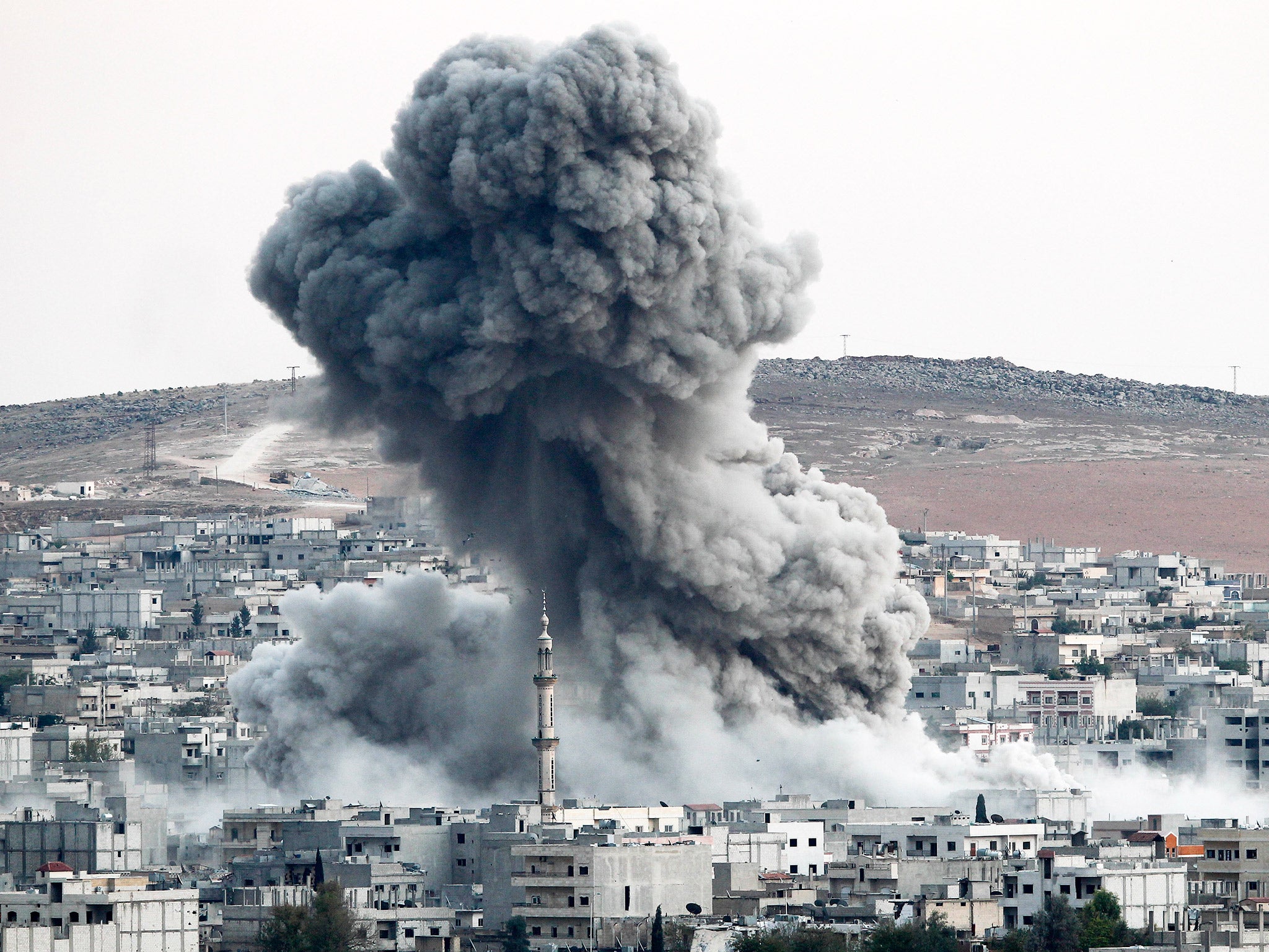 Smoke rises following an air strike by the US-led coalition in Kobani, last October