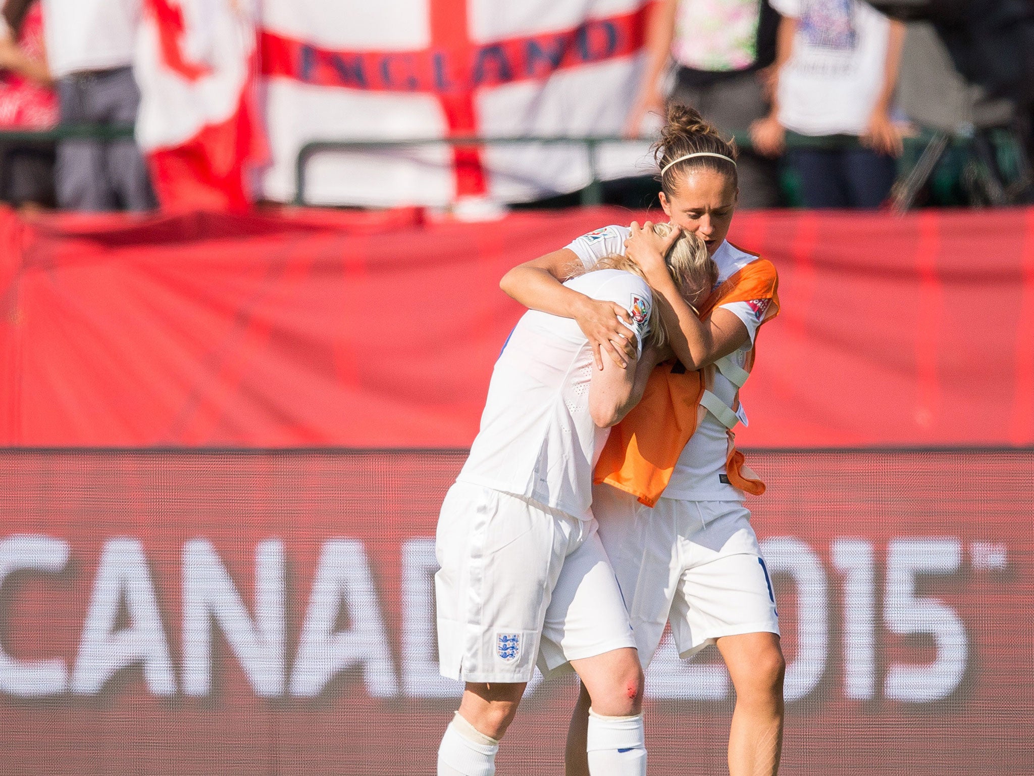 Laura Bassett is consoled by Jo Potter