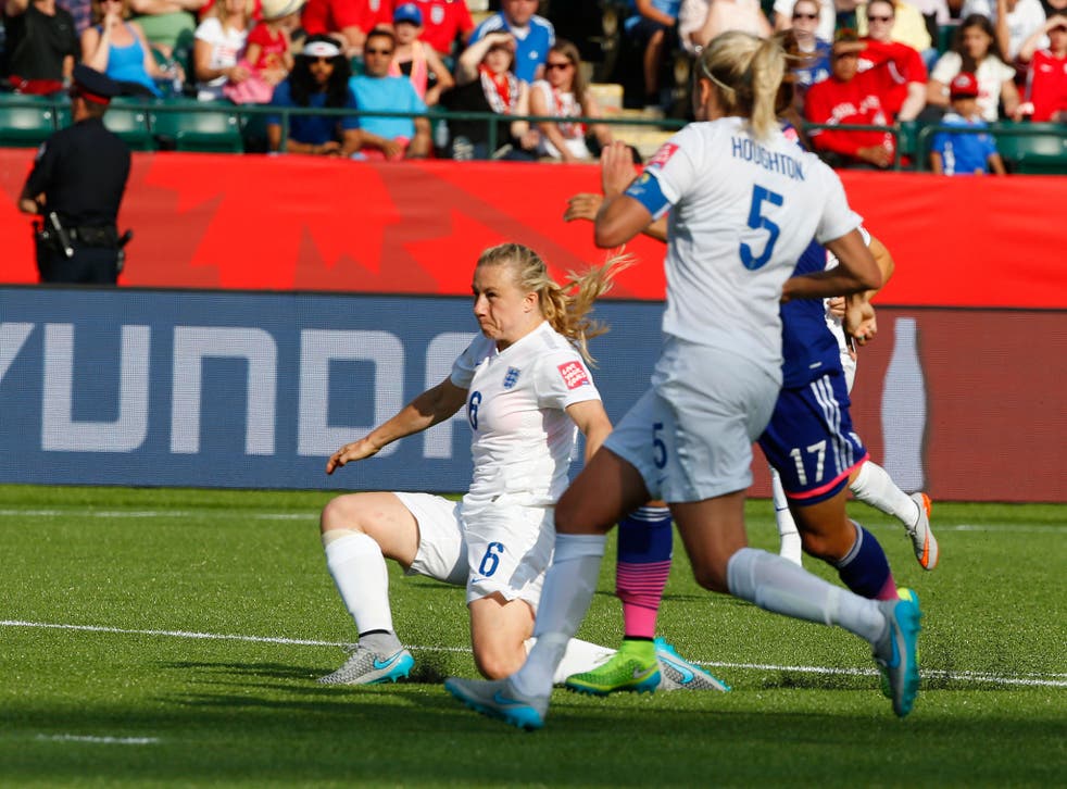 Laura Bassett looks on as she scores an own goal in the 2-1 defeat to Japan
