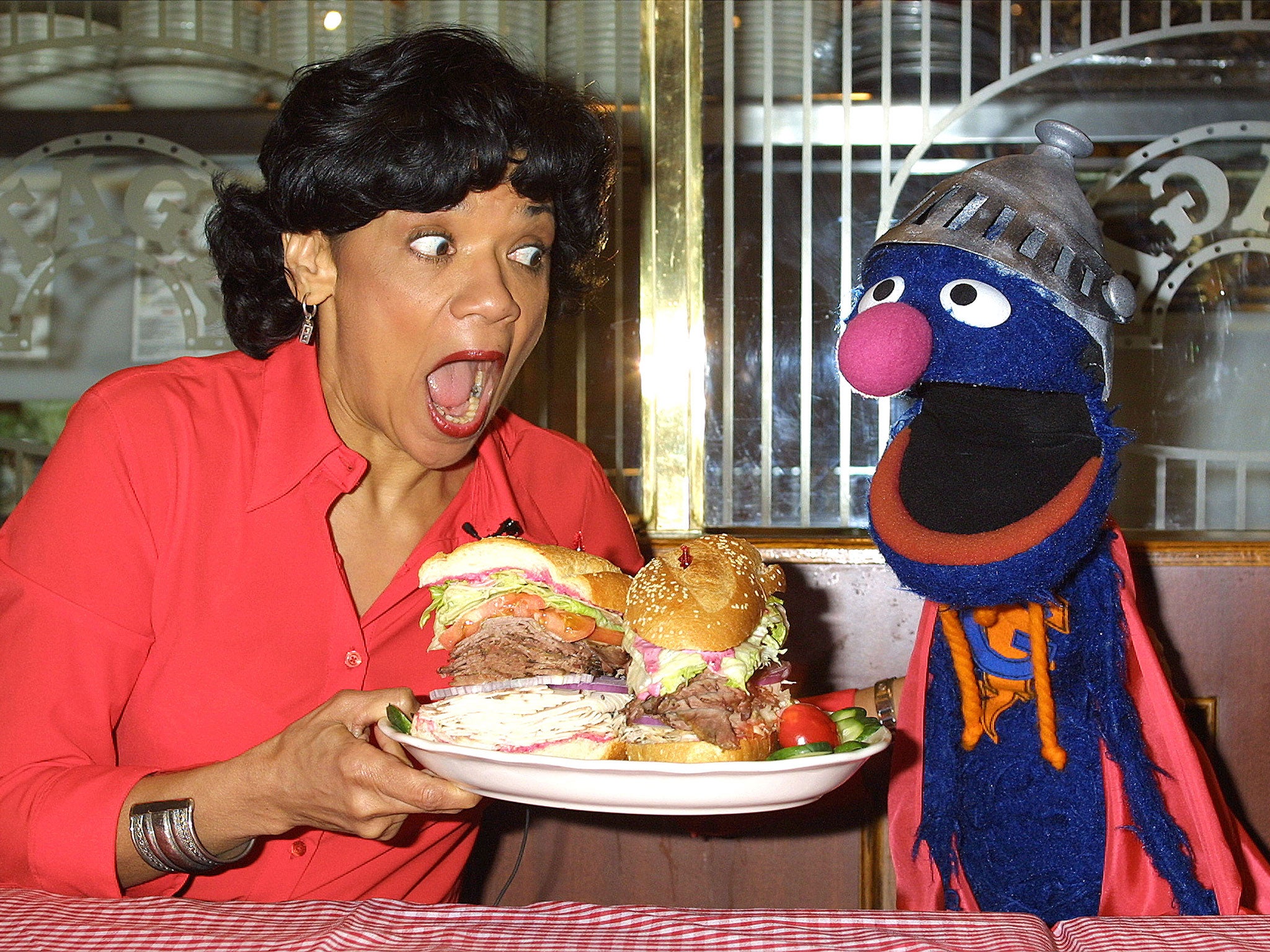 Sonia Manzano with Sesame Street character Grover in 2002