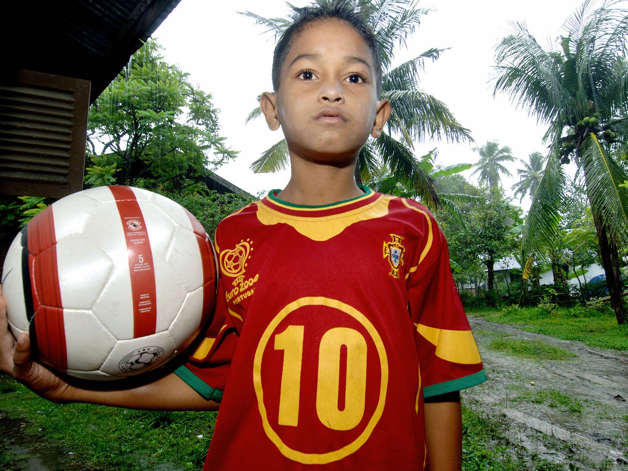 Martunis aged seven a year after the Tsunami