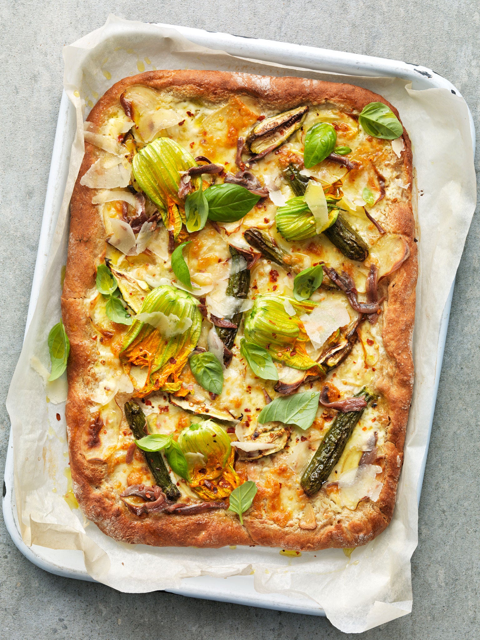 Courgette, anchovy, potato and mozzarella pizza