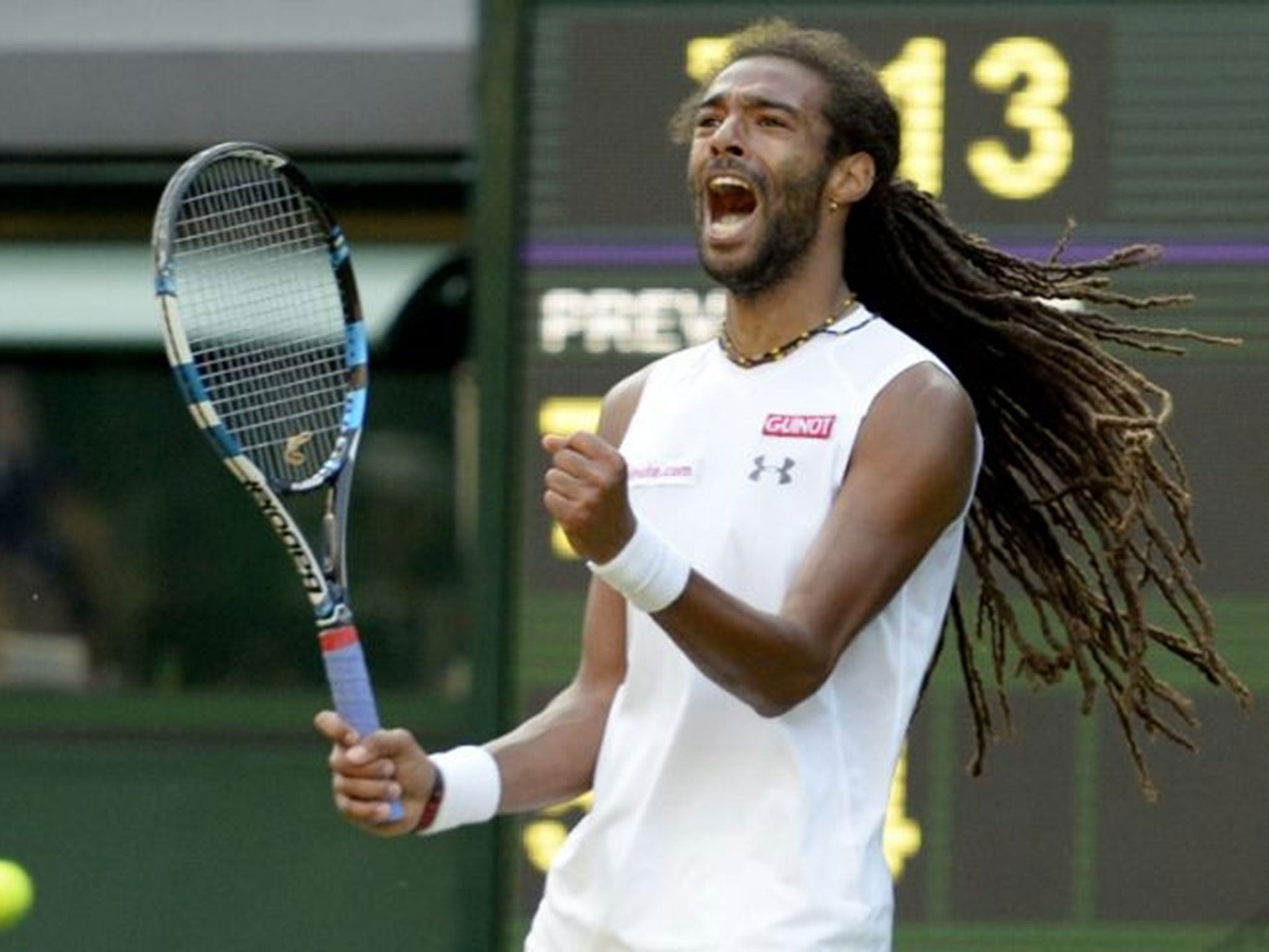 Dustin Brown of Germany in action against Rafael Nadal of Spain during their second round match for the Wimbledon Championships at the All England Lawn Tennis Club, in London, Britain, 02 July 2015.  