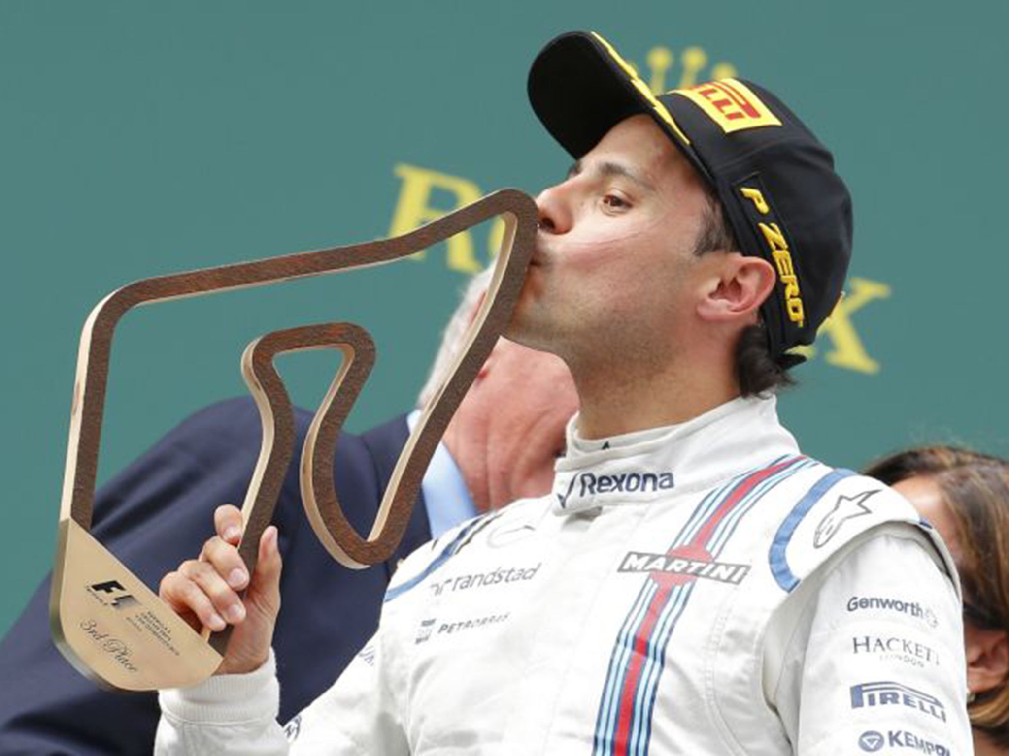 Williams’ Felipe Massa celebrates third place in the Austrian Grand Prix after team-mate Valtteri Bottas did the same in Canada