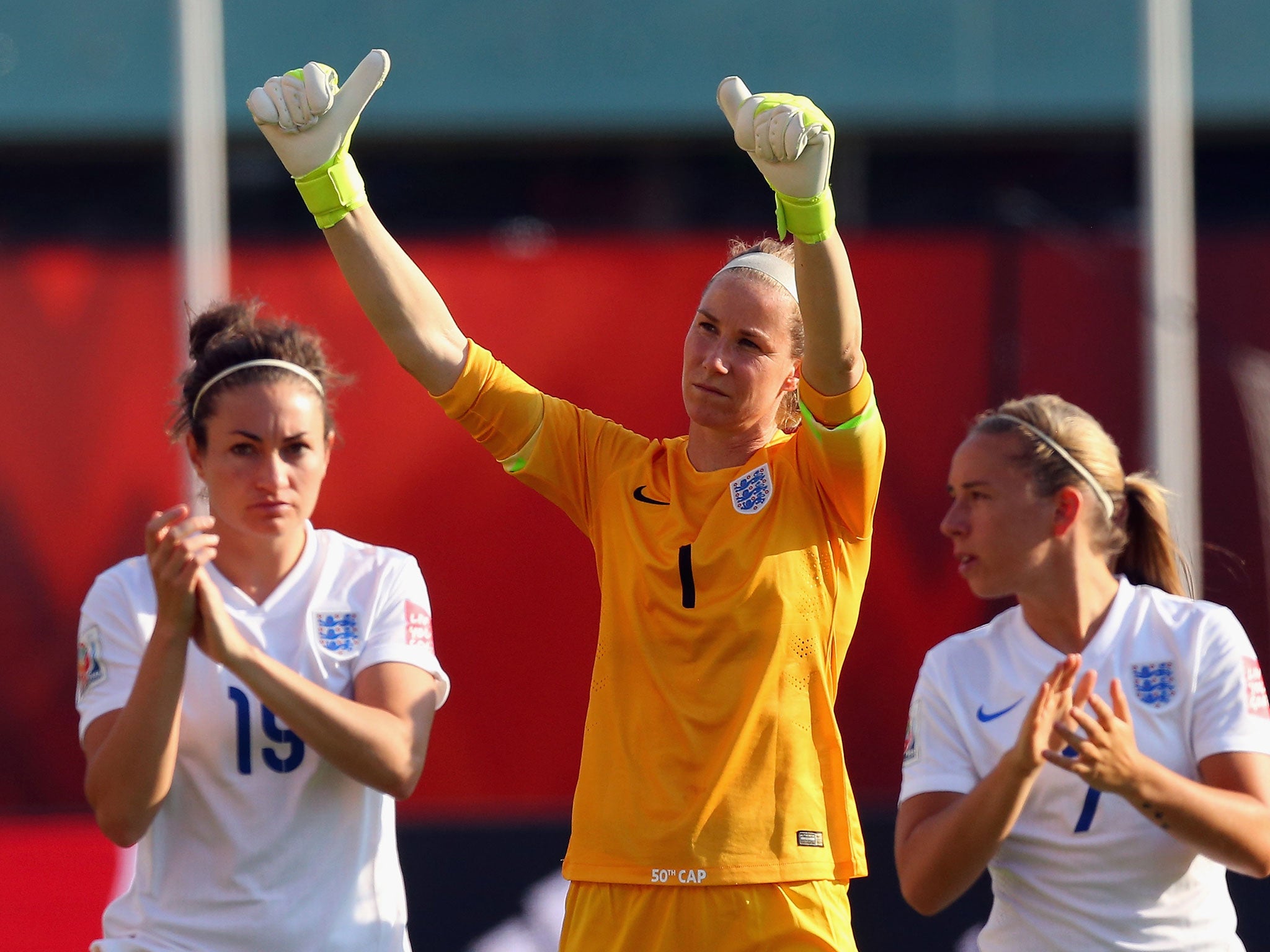 Jodie Taylor, Karen Bardsley and Jordan Nobbs applaud the crowd after England's World Cup defeat