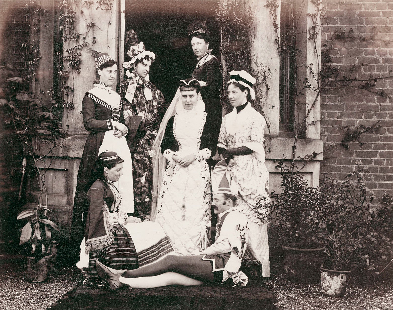 Group Portrait in costume, possibly at Manor House, Little Missenden, Buckinghamshire April 1878