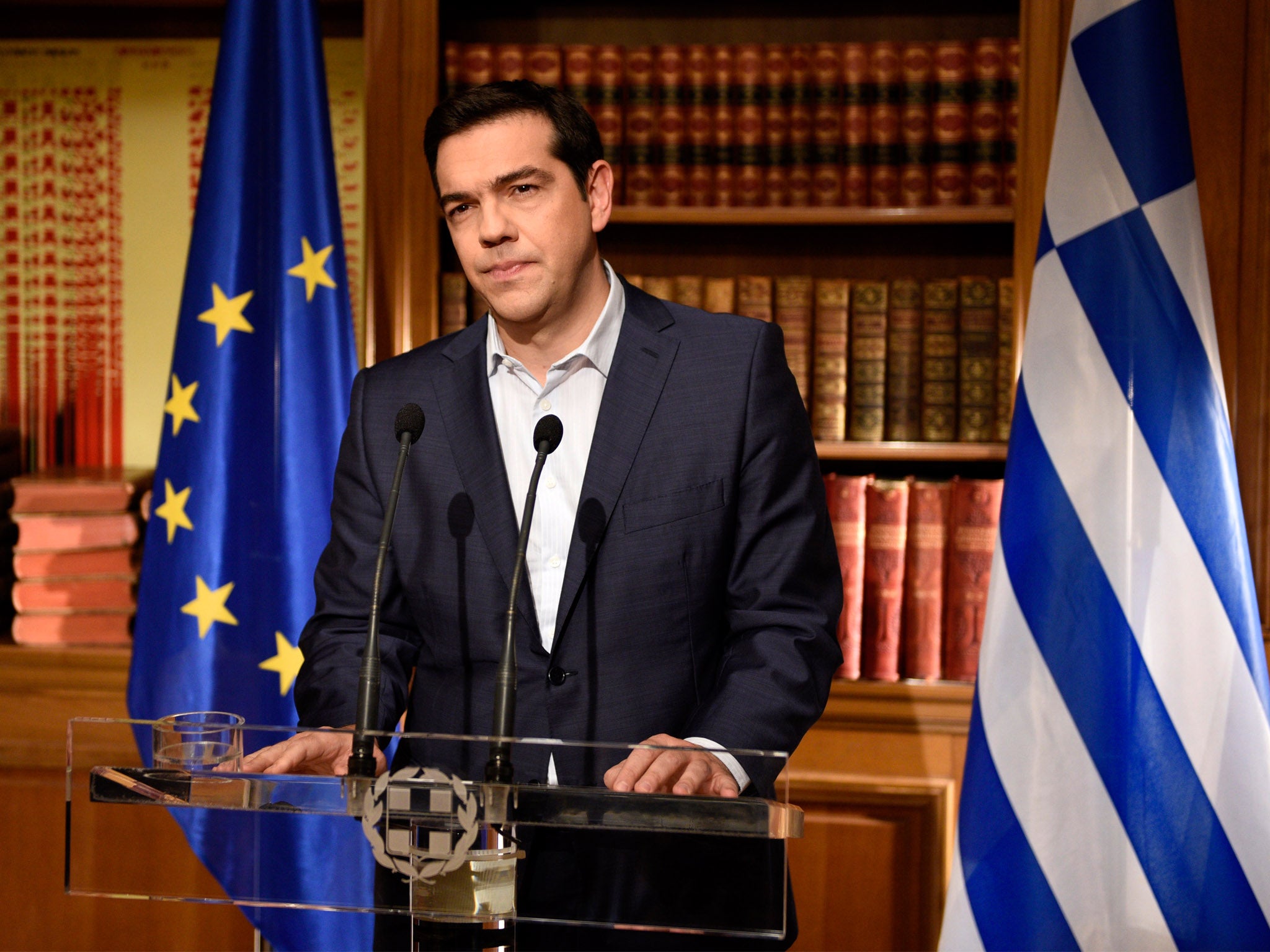 Greek Prime Minister Alexis Tsirpas delivers a televised address to the nation from his office at Maximos Mansion on 1 July 2015 in Athens, Greece