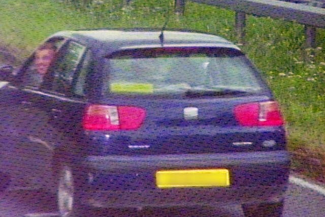 A car being driven by Alex McFarlane from Basildon as he and his grinning passenger activate a camera in Southend