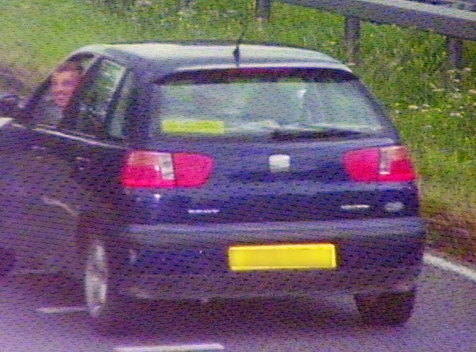 A car being driven by Alex McFarlane from Basildon as he and his grinning passenger activate a camera in Southend