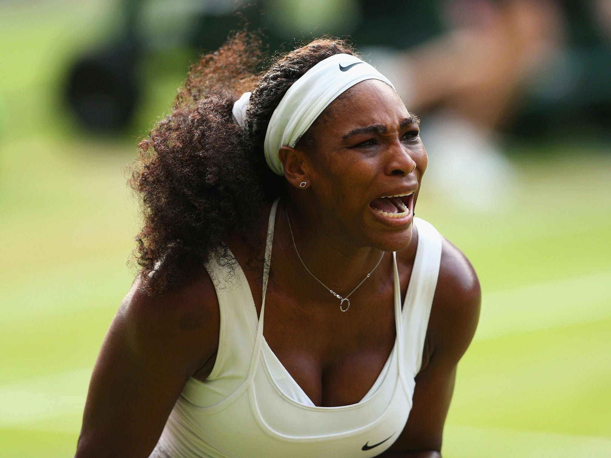 Serena Williams reacts to losing a point