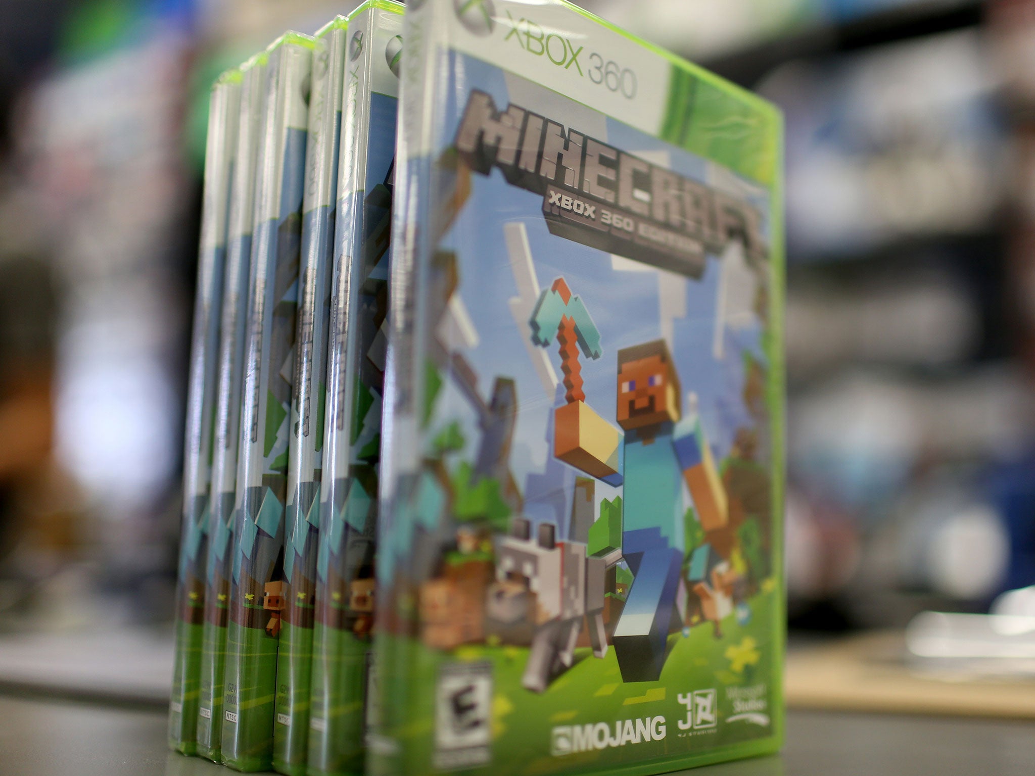 An XBox 360 Minecraft game is seen at a GameStop store on Septemeber 15, 2014 in Miami, Florida. Microsoft today announced it will acquire video game maker Mojang and its popular Minecraft game for $2.5 billion.