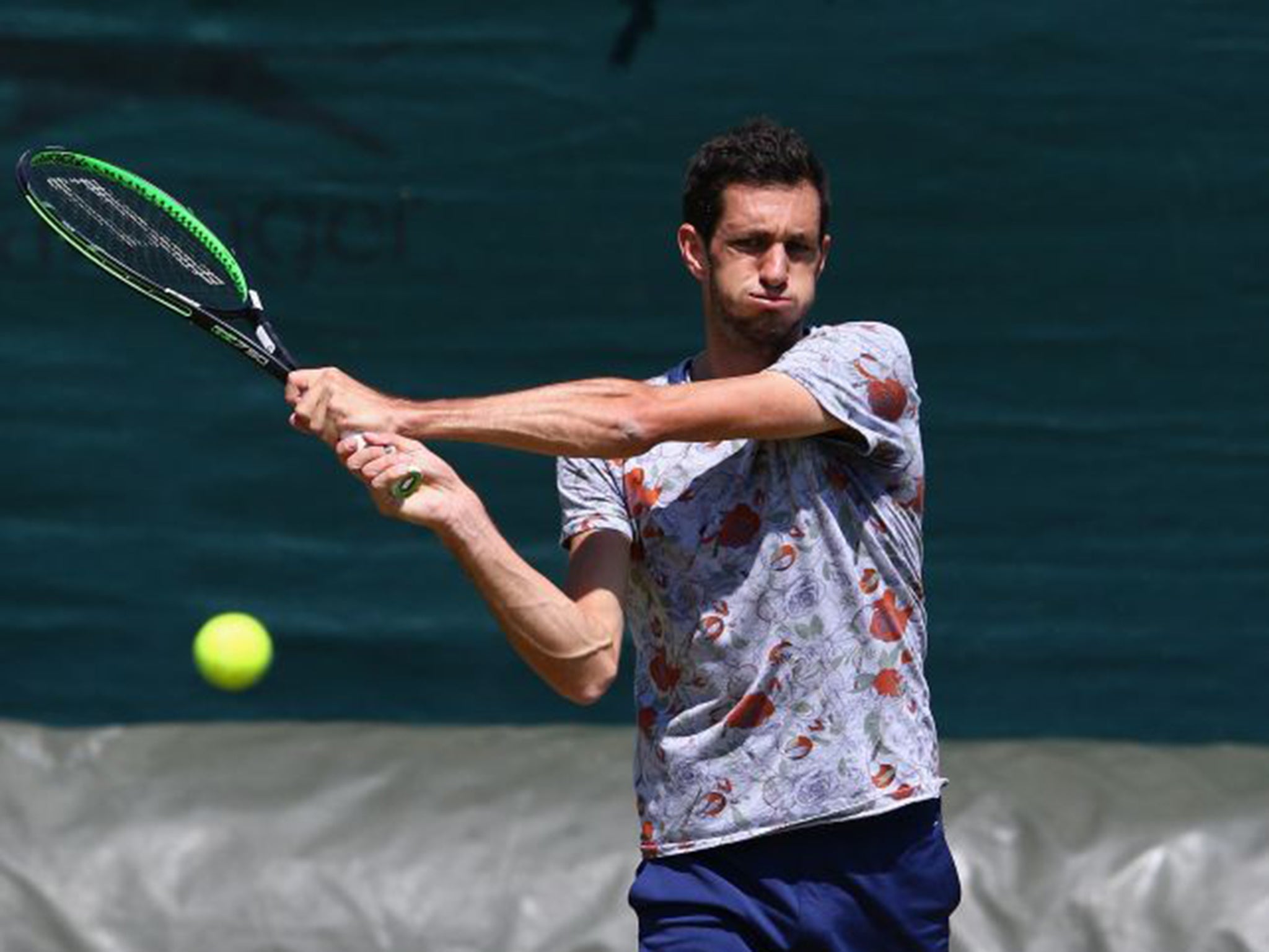 James Ward returns a shot during a practice session with Andy Murray on Friday