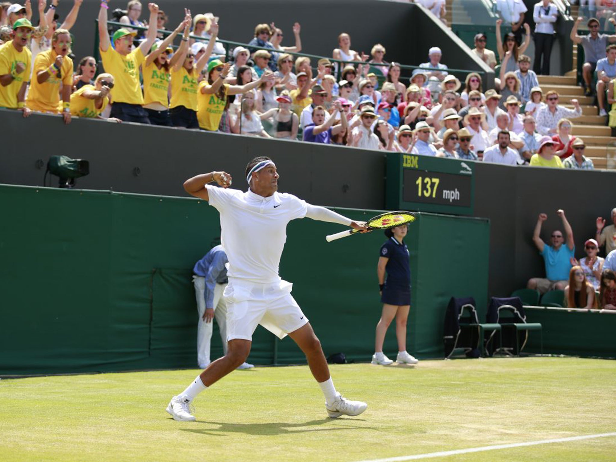 Nick Kyrgios and his yellow T-shirted fan club start to celebrate his victory over Milos Raonic on Friday