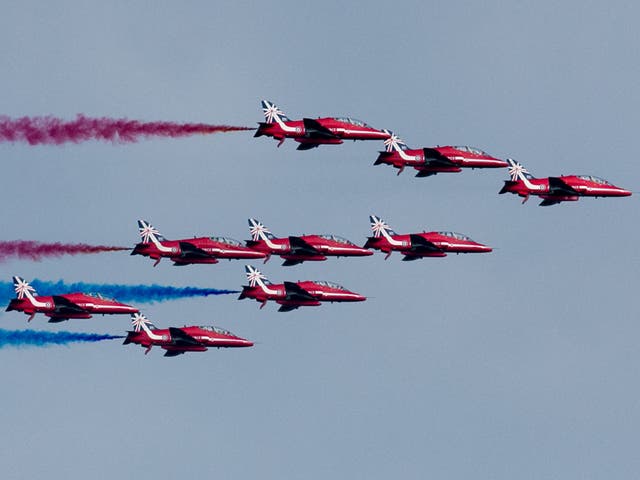 The Red Arrows, pictured here on a flypast above the Celtic Manor Resort on 5 September 2014 in Newport, Wales, were due to perform today at RAF Feltwell prior to the cancellation of the event