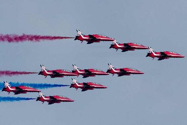 The Red Arrows, pictured here on a flypast above the Celtic Manor Resort on 5 September 2014 in Newport, Wales, were due to perform today at RAF Feltwell prior to the cancellation of the event
