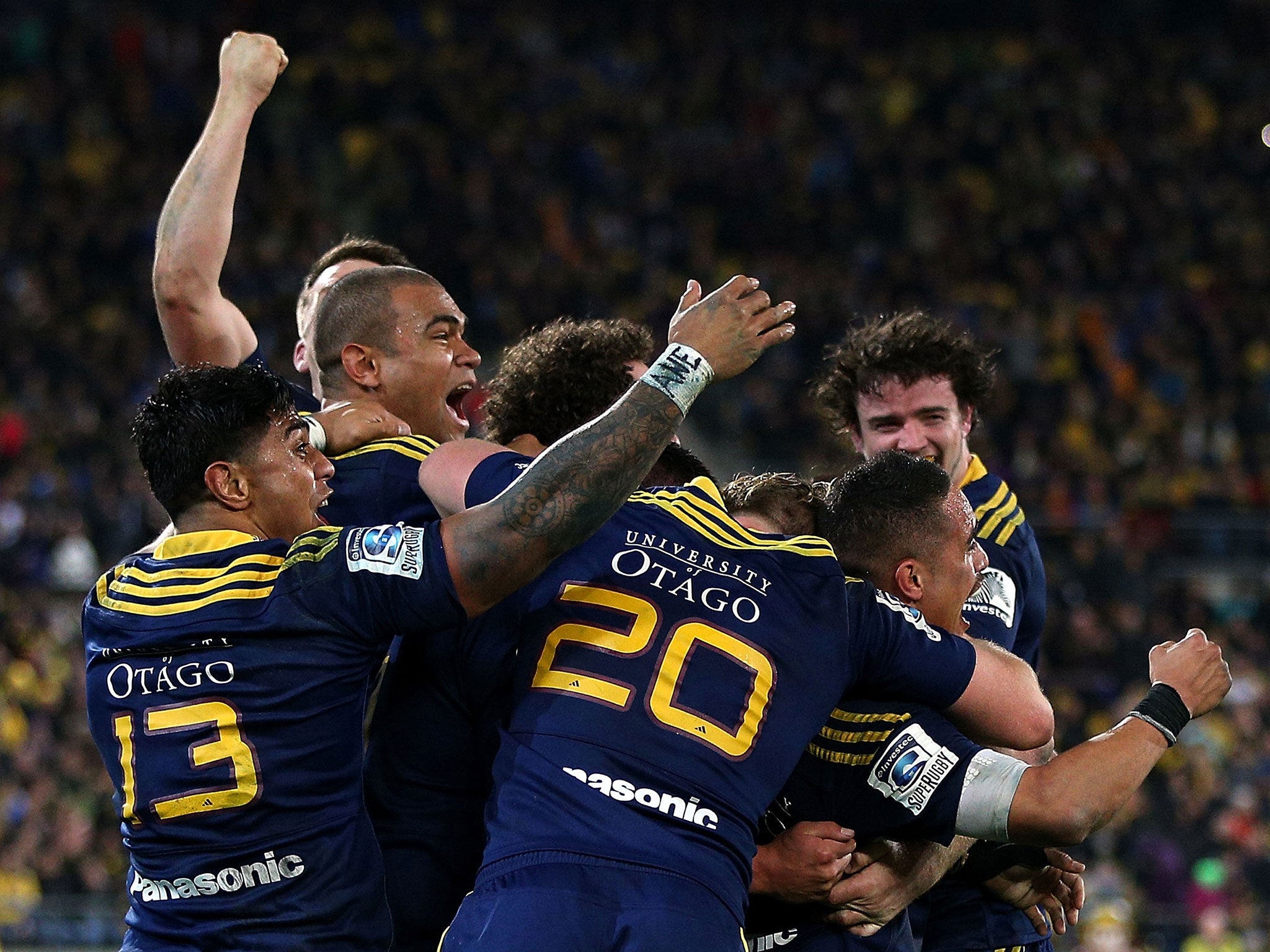 Otago Highlanders celebrate winning the Super Rugby title