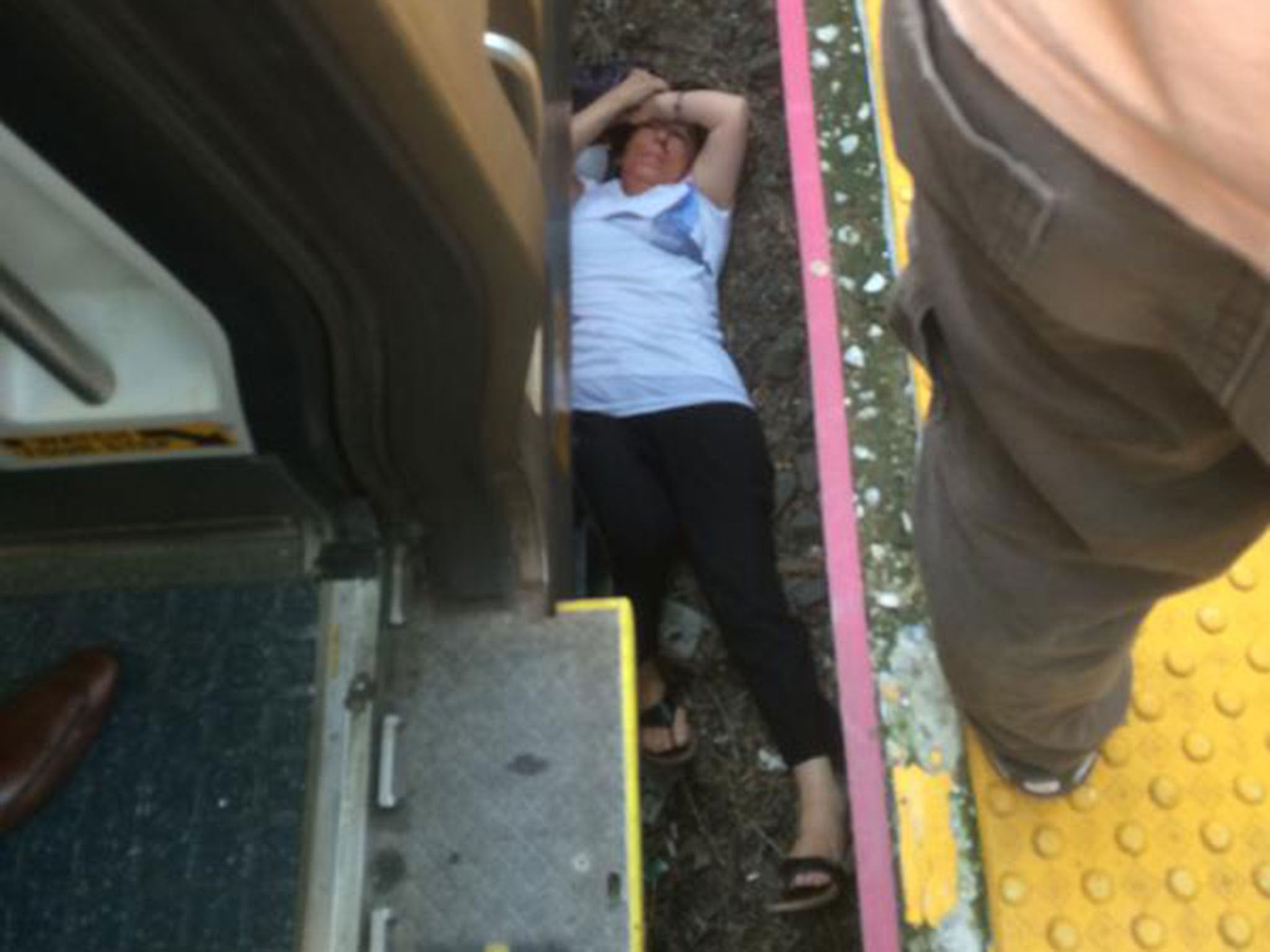 The woman was trapped under the train for thirty minutes (Photo: Ryan Sprotte/ Twitter)