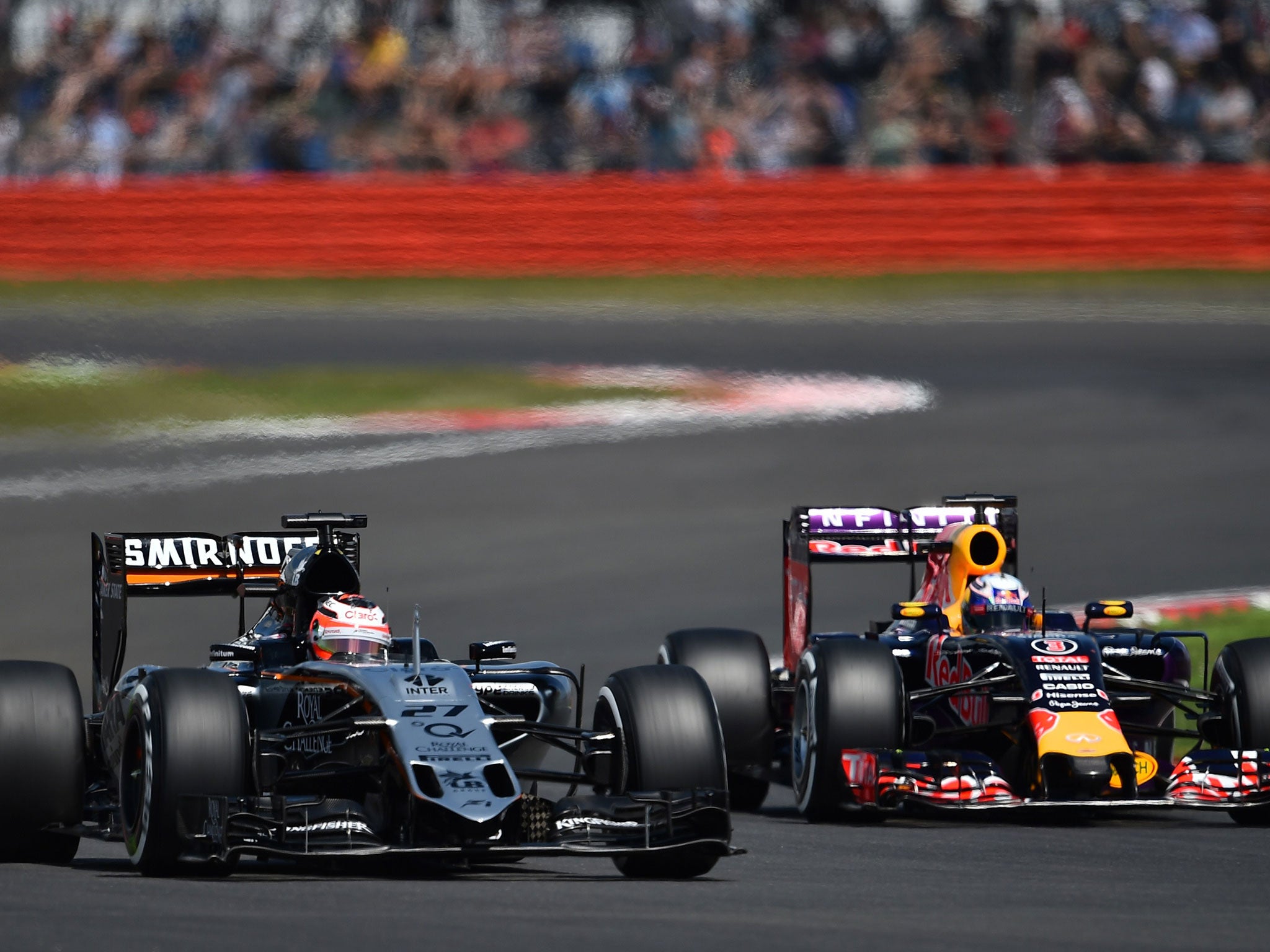 Nico Hulkenberg and Daniel Ricciardo run sun-by-side