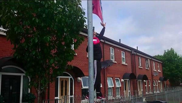 A youth football coach says that he removed the flag after it was erected outside the home of one of his young players (Photo: Allison Morris/ Twitter)