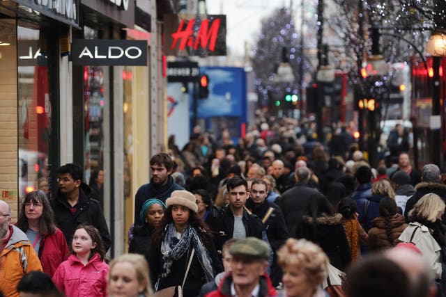 Shoppers make their way down Oxford Street on 24 December 2012 in London, England